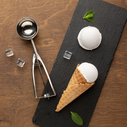 Wukusy stainless steel ice cream serving scoop with trigger release, premium quality ice cream spoon and scooper in close-up.