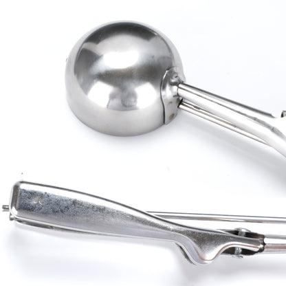 Wukusy stainless steel ice cream serving scoop with trigger release, premium quality ice cream spoon and scooper in close-up.