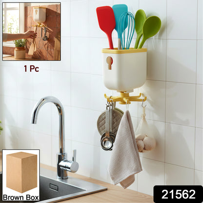 Wukusy 360 rotating heavy-duty sticky wall hook for versatile storage, showing the hook attached to a wall with items hanging.