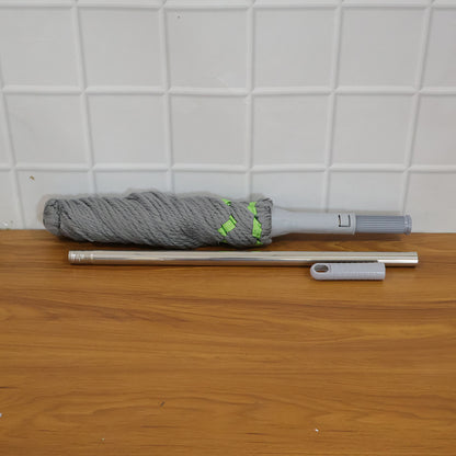 Wukusy 360 Spin Mop for floor cleaning, featuring a rotating head and ergonomic handle for easy mopping and quick drying.