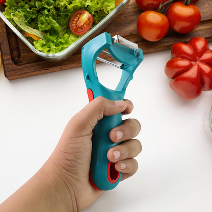 Wukusy 4-in-1 multi-functional vegetable and fruit peeler with interchangeable blades for peeling, julienning, and slicing.