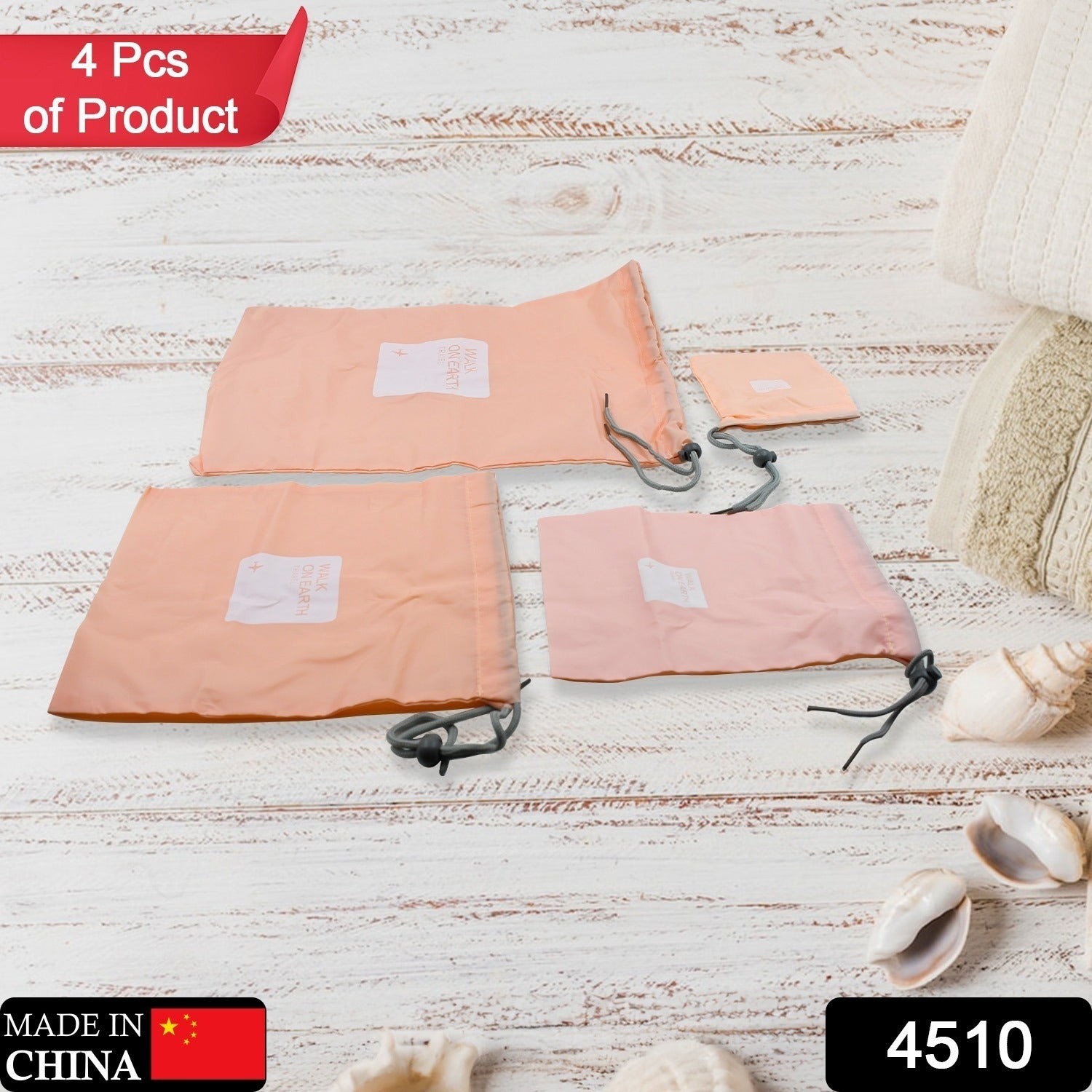 Set of four Wukusy waterproof nylon travel storage bags with drawstrings for organizing clothes, shoes, and accessories in luggage.