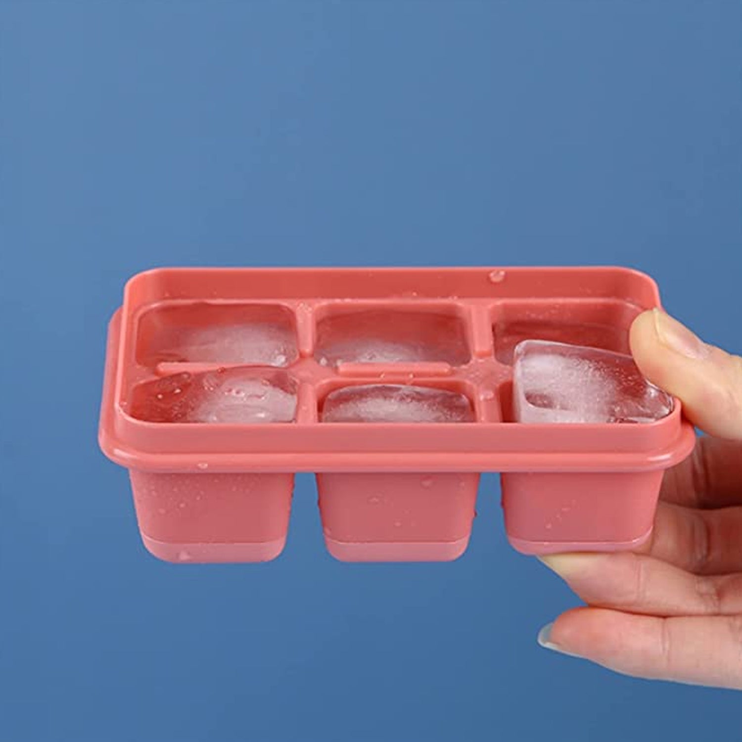 Wukusy 6-cavity silicone ice tray for household kitchens, used for making ice from water and other liquids.
