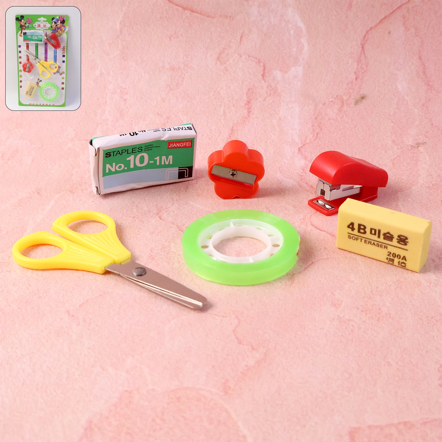 Wukusy 6-in-1 mini stationery kit for students with pens, pencils, eraser, sharpener, ruler, and sticky notes in compact case.