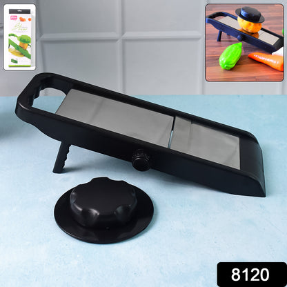 Wukusy 8120 Ganesh adjustable plastic slicer in black and silver, 1-piece kitchen tool for slicing vegetables and fruits.