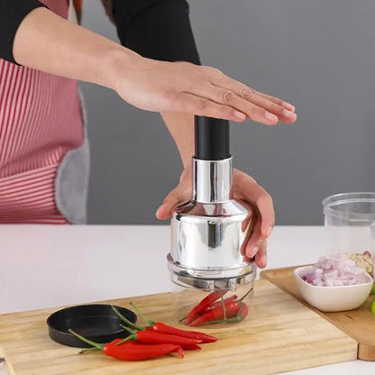 Wukusy 8189 Food Cutter with stainless steel blades for chopping onions, garlic, vegetables, nuts, and salads in the kitchen.