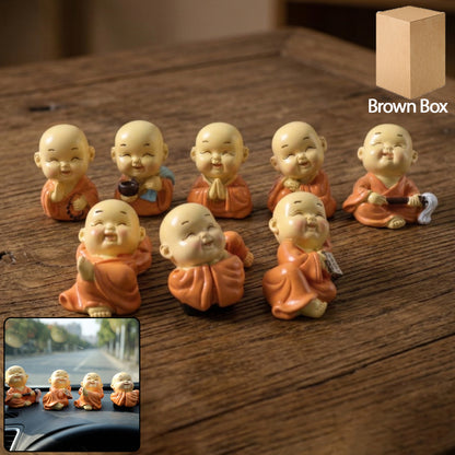 Set of eight mini Buddha monk idols by Wukusy, featuring detailed, adorable miniature Buddha figures for spiritual decor.