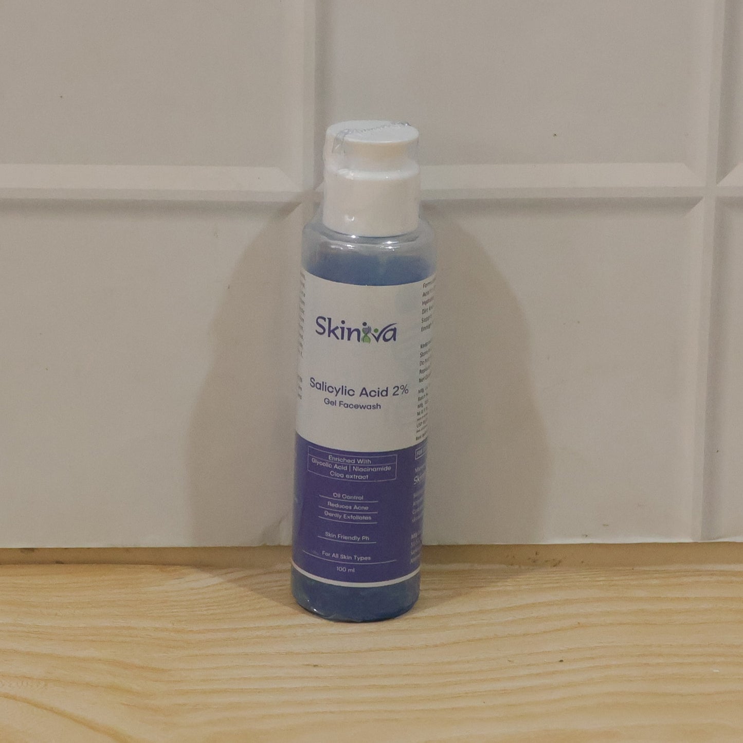 Wukusy Advanced Salicylic Acid Gel Face Wash in 100ml tube, suitable for acne-prone skin, with a clear gel texture.