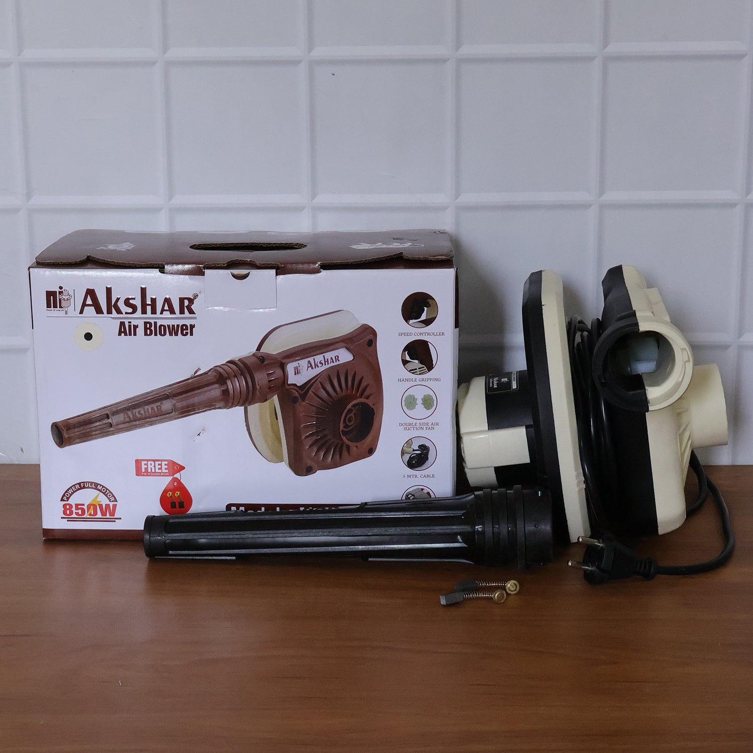 Wukusy Akshar Electric Air Blower Ai0040 with 850W motor, showcasing the compact handheld design and power cord.