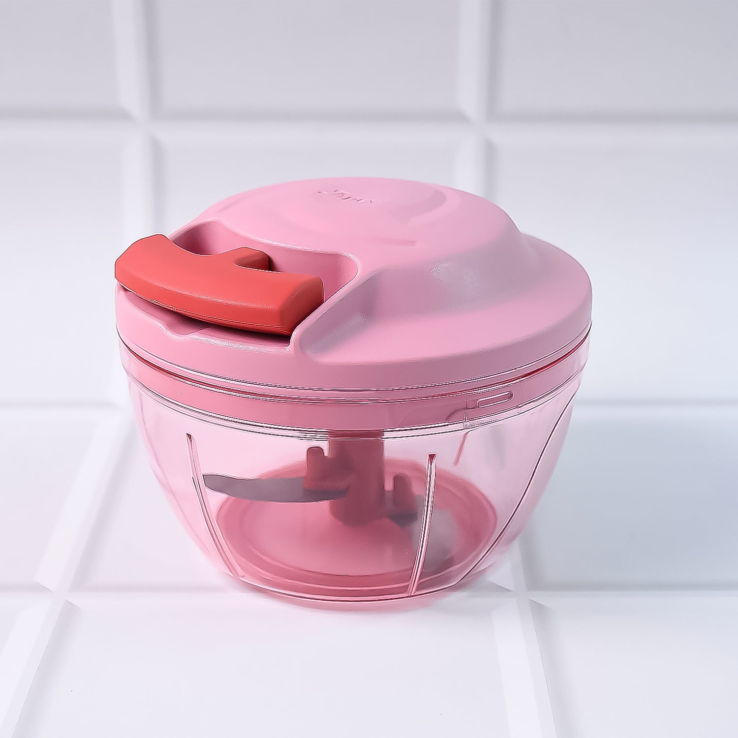 Wukusy Apex Power-x vegetable chopper with triple stainless steel blades and hand pull, shown with 500ml capacity container.