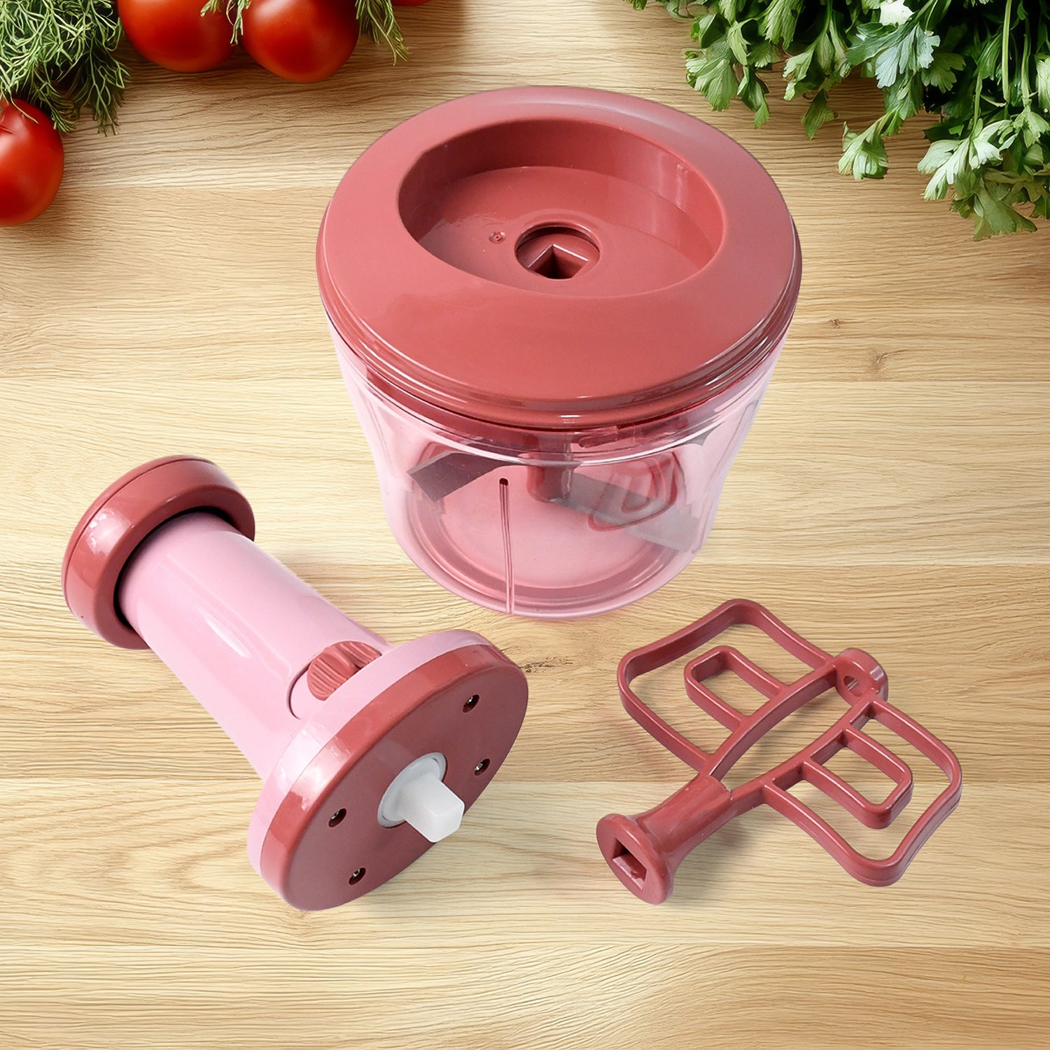 Wukusy Apex Quba Push Chopper with stainless steel blades and 1000ml capacity, shown with chopped vegetables inside.
