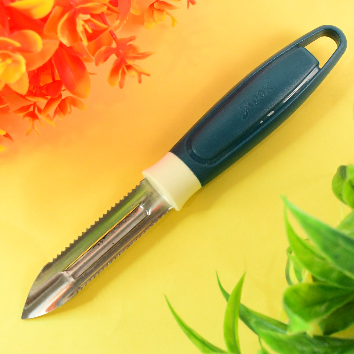 Wukusy Apex stainless steel blade potato peeler with ergonomic handle and sharp peeling blade, suitable for efficient kitchen use.