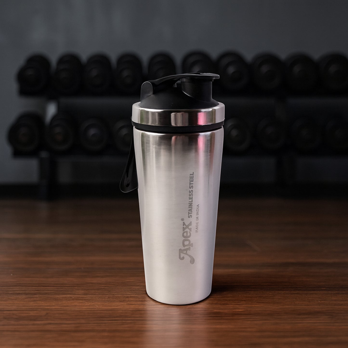 Wukusy Apex stainless steel gym shaker bottle with spring, 1000ml capacity, designed for protein shakes and fitness drinks.