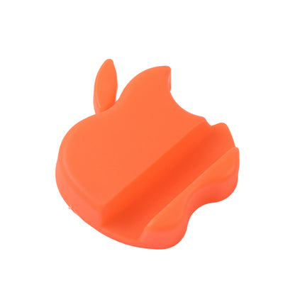Colorful Apple-shaped plastic mobile phone holder by Wukusy, designed to keep your device steady and accessible.