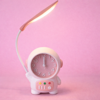Wukusy astronaut table lamp with built-in clock, ideal for kids' study desks and bedrooms, featuring a playful astronaut design.