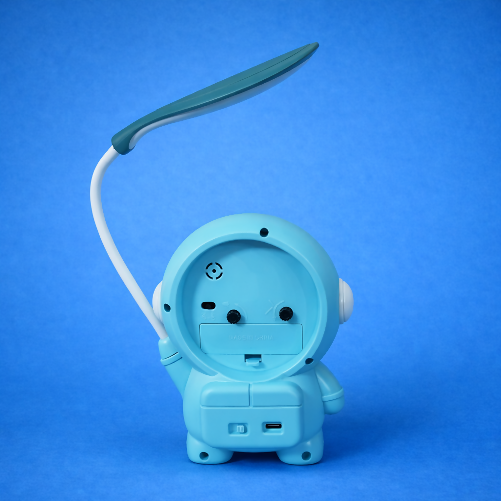 Wukusy astronaut table lamp with built-in clock, ideal for kids' study desks and bedrooms, featuring a playful astronaut design.