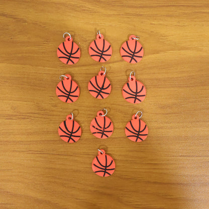Wukusy basketball design bag charm keychain set featuring 10 colorful basketball-themed accessories for bags and keys.
