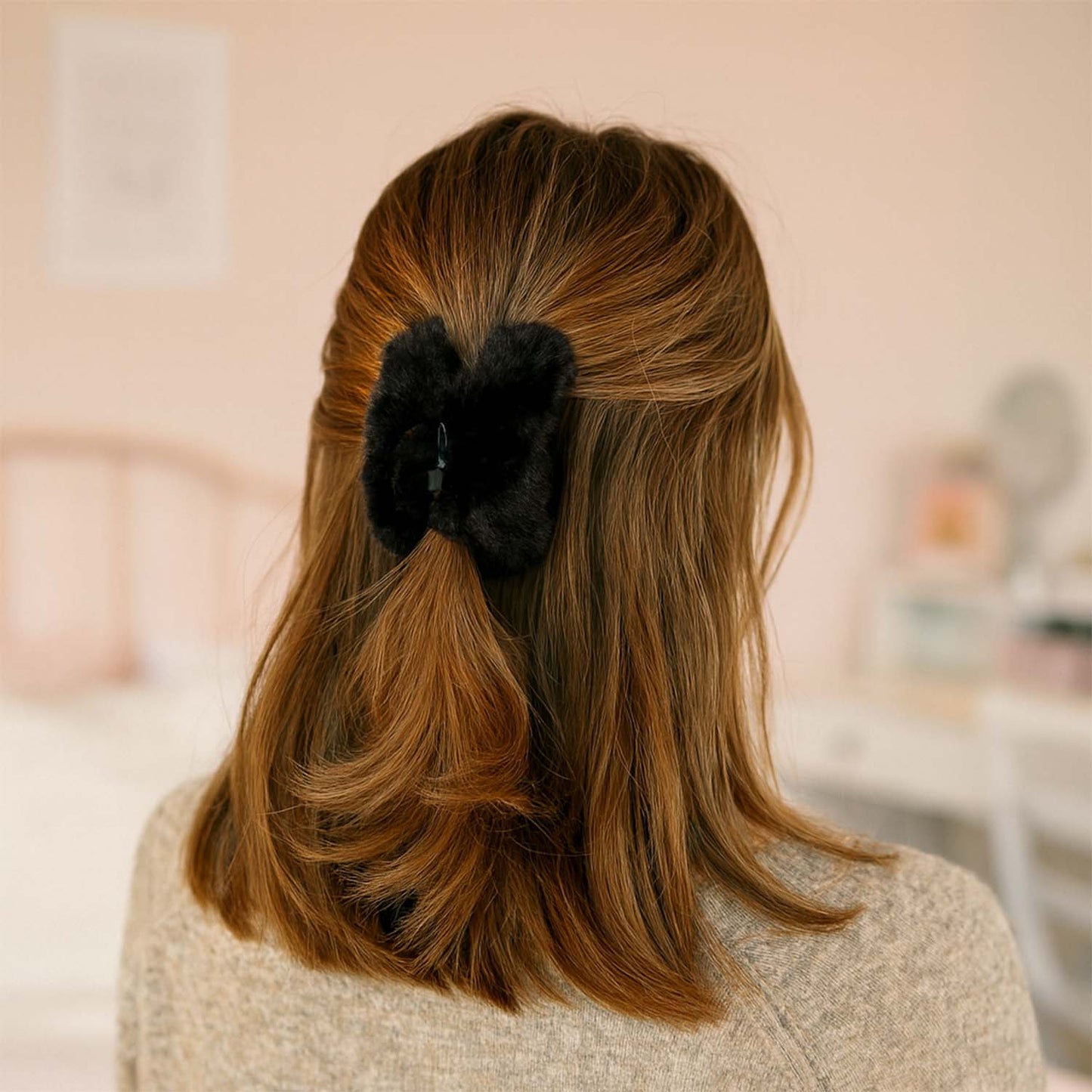 Wukusy big-size soft faux fur hair claw clip, natural brown color, showcasing its plush texture and large grip for hair styling.
