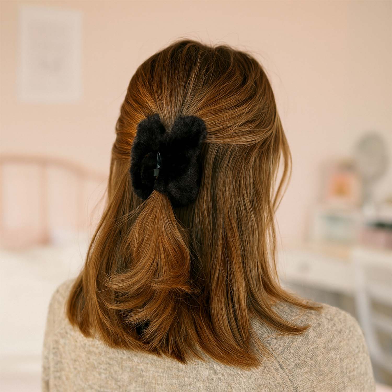 Wukusy big-size soft faux fur hair claw clip, natural brown color, showcasing its plush texture and large grip for hair styling.