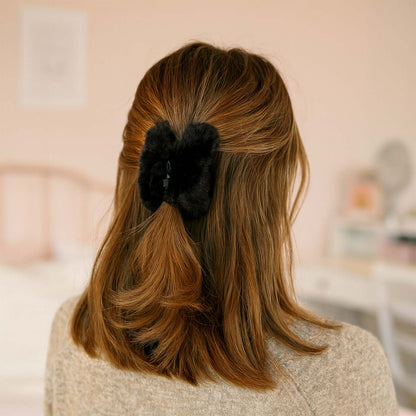Wukusy big-size soft faux fur hair claw clip, natural brown color, showcasing its plush texture and large grip for hair styling.