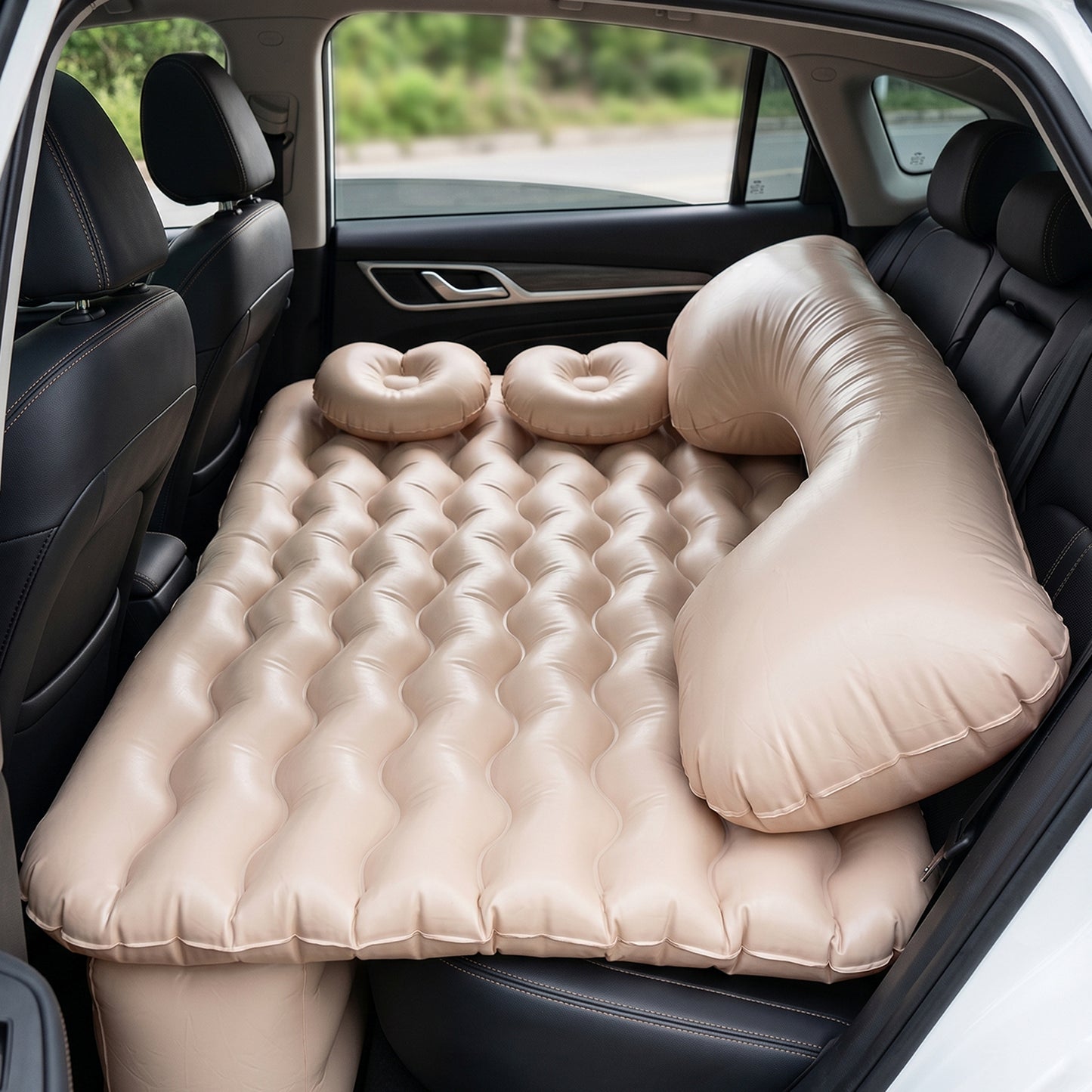 Wukusy car air mattress bed set with inflatable pillows and air pump, perfect for comfortable travel sleeping inside a vehicle.