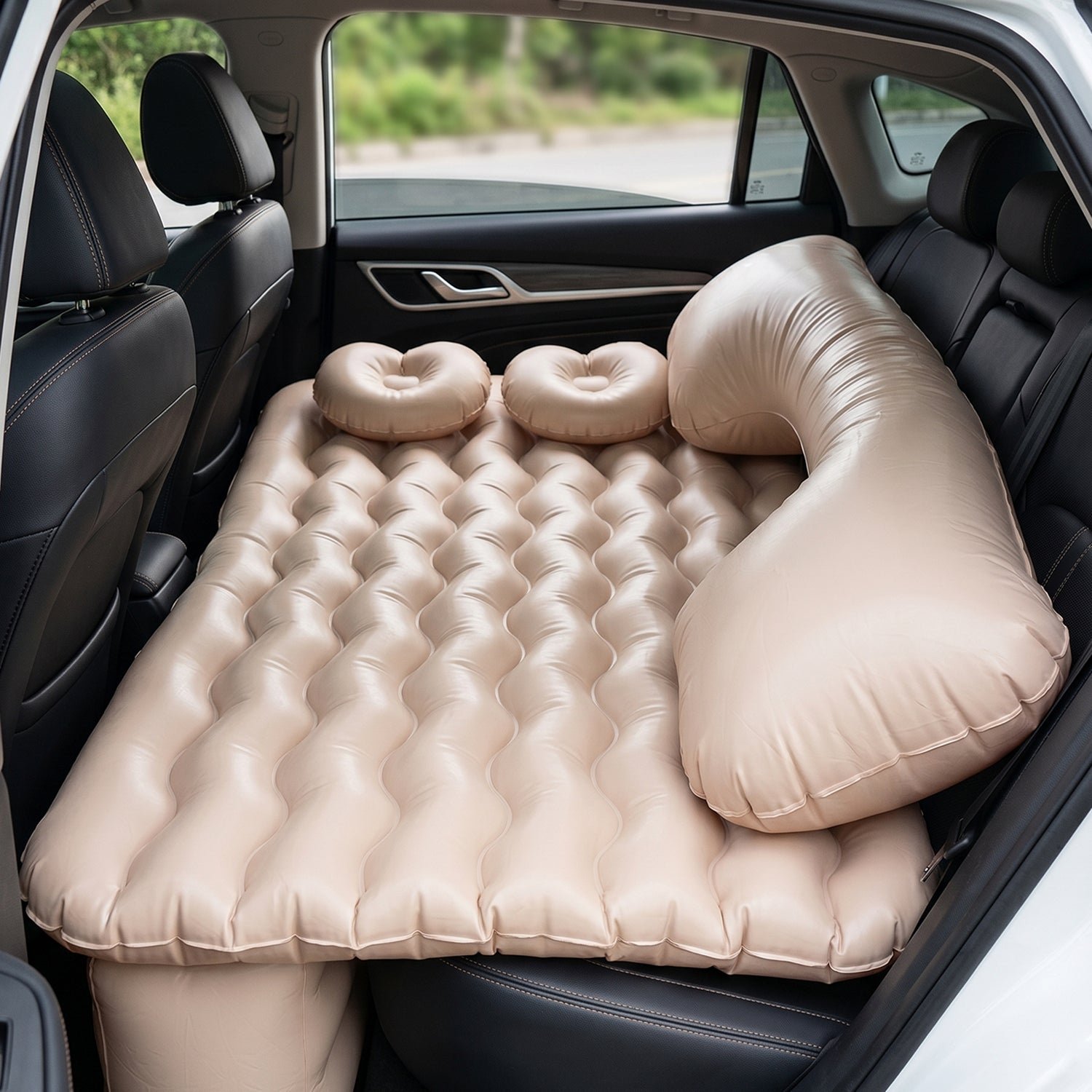 Wukusy car air mattress bed set with inflatable pillows and air pump, perfect for comfortable travel sleeping inside a vehicle.