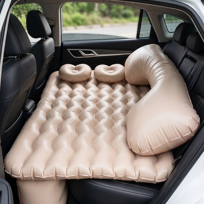 Wukusy car air mattress bed set with inflatable pillows and air pump, perfect for comfortable travel sleeping inside a vehicle.