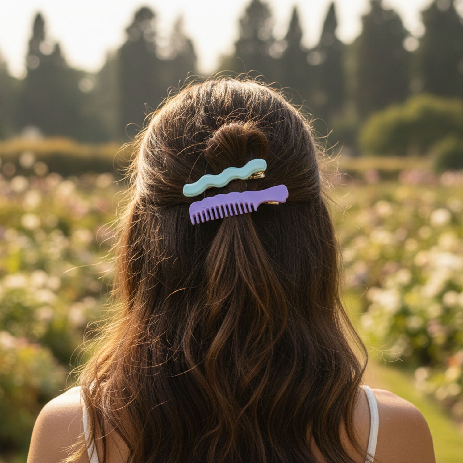 Set of four Wukusy comb-shaped hair clips for girls and women, stylish hair pins with decorative design.