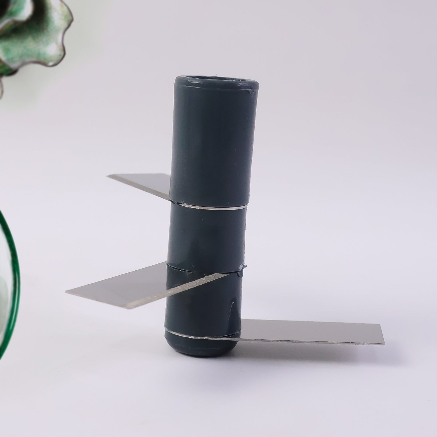 Wukusy compact manual vegetable chopper with hand press, stainless steel blades for efficient vegetable chopping in the kitchen.