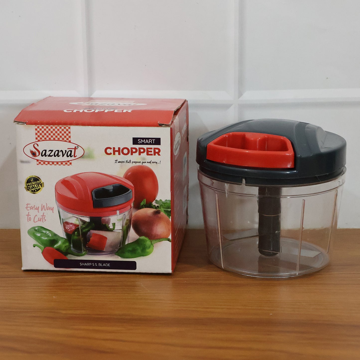Wukusy compact manual hand-press vegetable chopper with stainless steel blades and ergonomic handle for easy food prep.