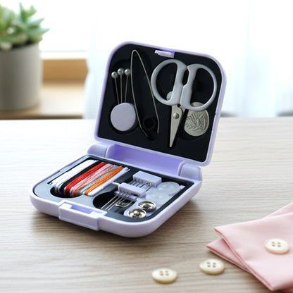Wukusy compact portable sewing kit with scissors, needles, and threads in a small, organized case for travel or home use.
