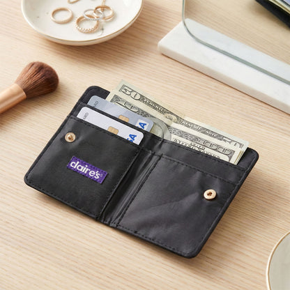 Wukusy compact snap button card holder wallet with multiple card slots and secure closure, designed for easy carrying.