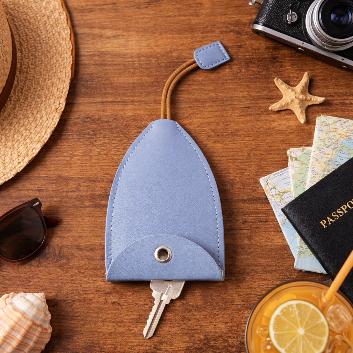 Wukusy compact travel keyholder pouch with wrist strap, black nylon with zipper closure and keyring inside for secure key storage.
