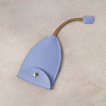 Wukusy compact travel keyholder pouch with wrist strap, black fabric, holds keys securely, ideal for on-the-go travel.