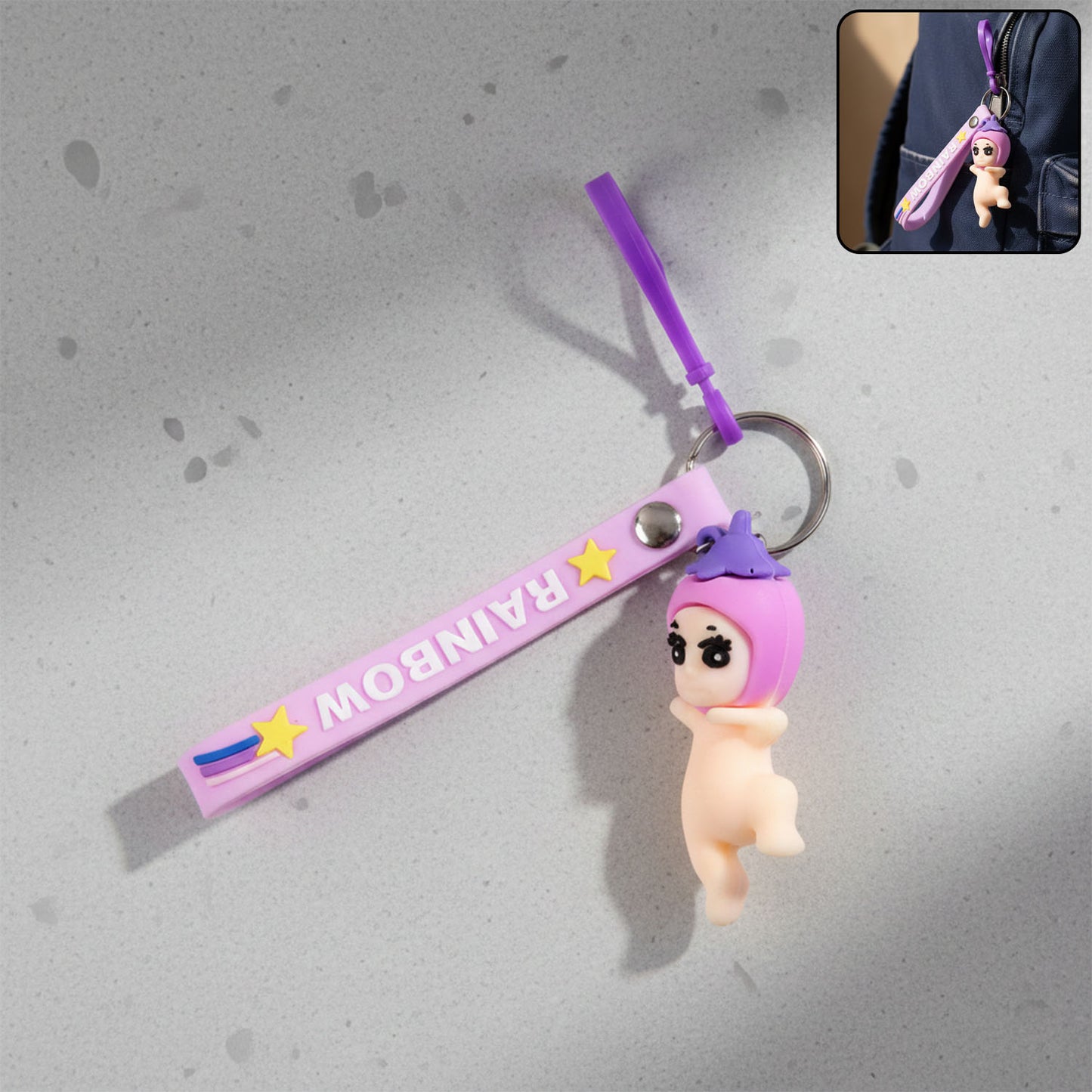 Wukusy cute baby doll cartoon silicone keychain hanging from a keyring, colorful and adorable accessory for keys or bags.