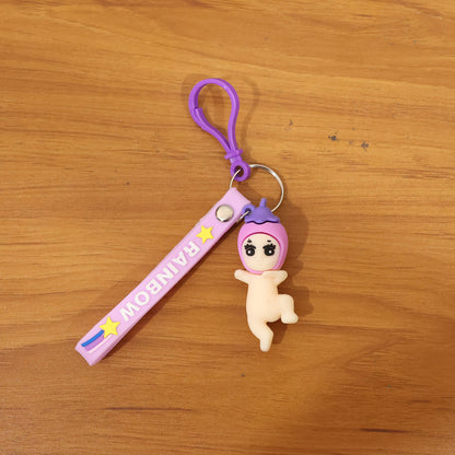 Wukusy cute baby doll cartoon silicone keychain, colorful and soft, featuring a charming baby doll design on a keyring.