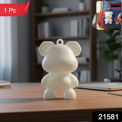 Wukusy cute bear-shaped mini figure keychain attached to a keyring, featuring a detailed bear design in bright colors.