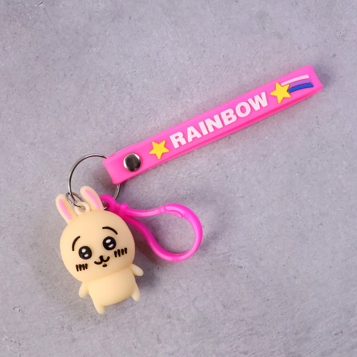 Wukusy cute bunny character keychain featuring a detailed plush bunny design, perfect for bags or keys.