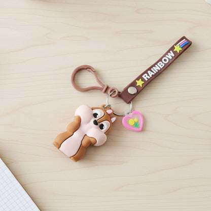 Cute cartoon animal silicone keychain with rainbow strap from Wukusy, featuring a colorful, playful design.