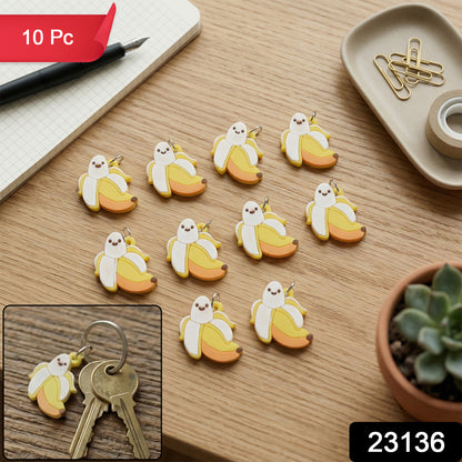 Set of 10 Wukusy cartoon banana bag charm keychains featuring cute, colorful banana designs for bags and accessories.