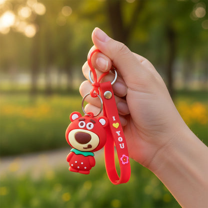 Cute cartoon bear figure keychain by Wukusy, featuring a plush bear design and a metal keyring attachment.