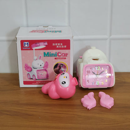 Pink cartoon bunny car-style table alarm clock by Wukusy featuring a cute bunny design and digital display.