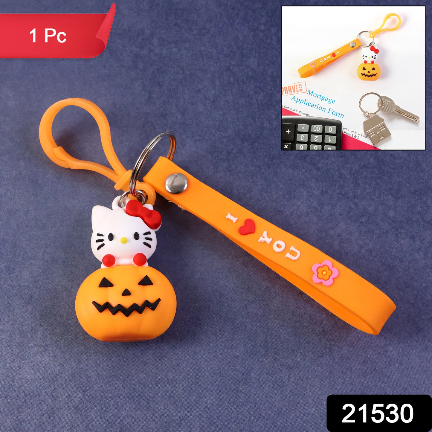 Cute cartoon cat pumpkin-themed silicone keychain from Wukusy, featuring a colorful feline design on a small, durable accessory.