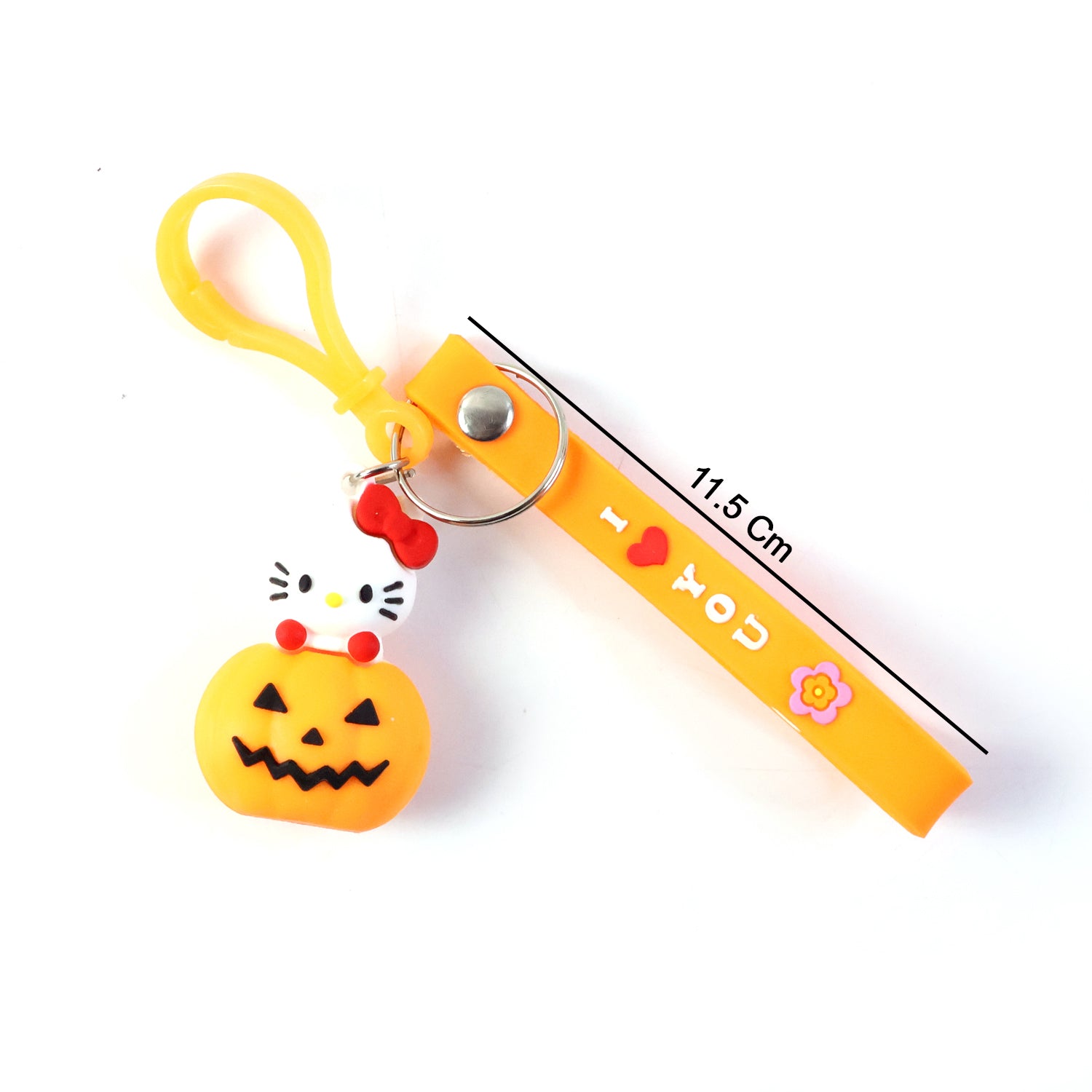 Cute cartoon cat pumpkin-themed silicone keychain by Wukusy featuring a playful cat design and vibrant Halloween-inspired colors.