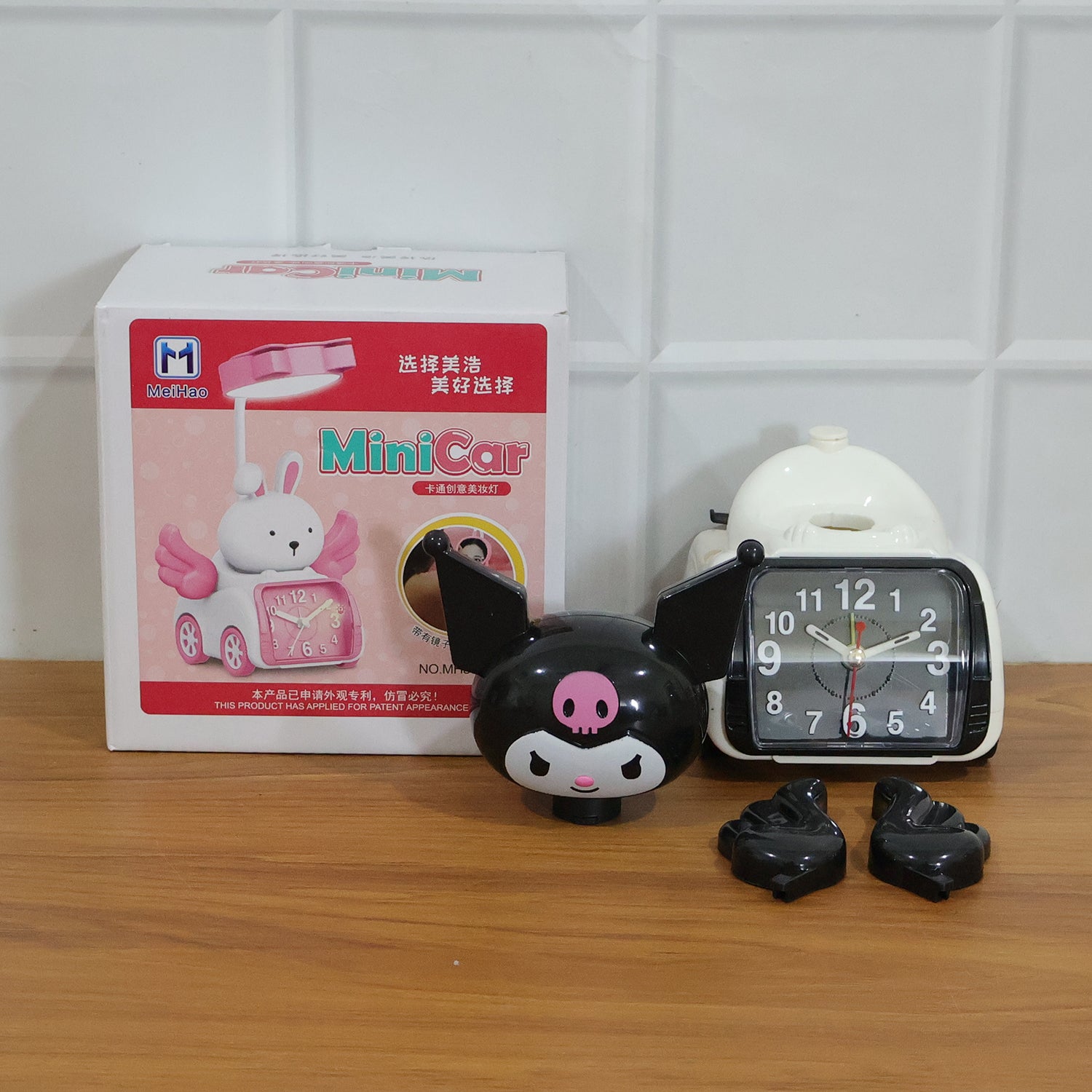 Wukusy cute cartoon character car-style table alarm clock on a desk showing time and colorful design
