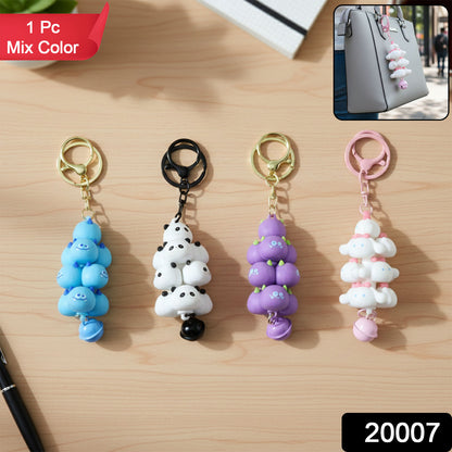 Colorful Wukusy cartoon cloud stack keychain with bell, featuring a cute cloud design in mixed colors.