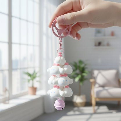 Cute cartoon cloud stack keychain with bell from Wukusy in mixed colors, featuring a playful cloud design and a small bell attachment.