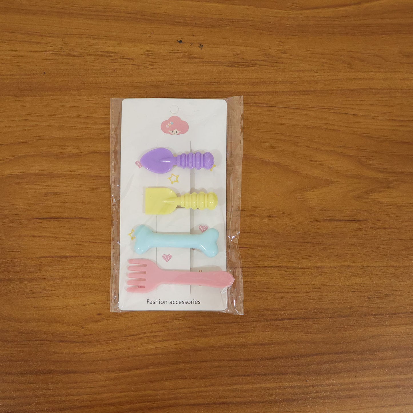 Set of four Wukusy cute cartoon food shape hair clips featuring playful designs for kids’ hair accessories.