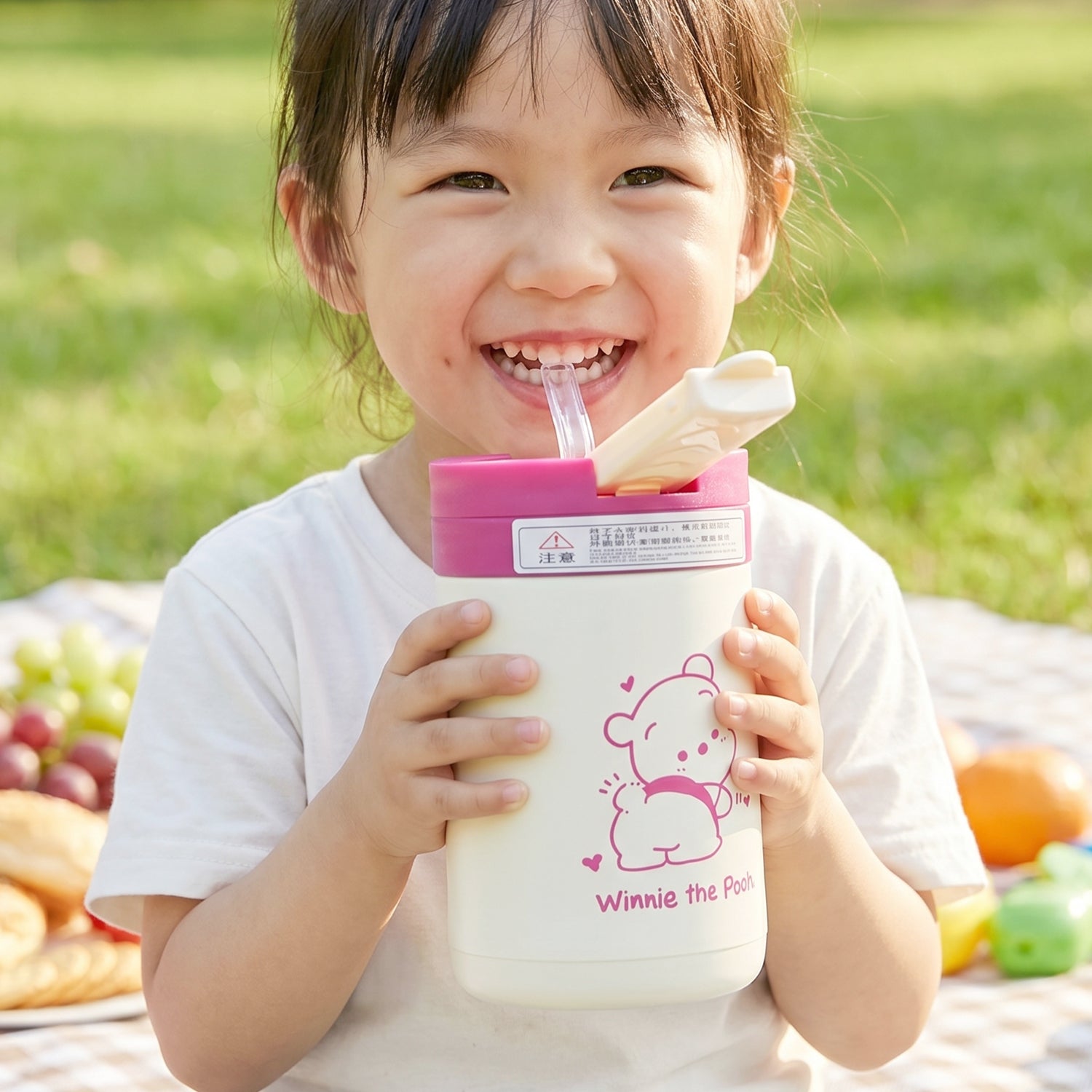 Wukusy cute cartoon printed glass tumbler with lid and straw, 400 ml, featuring colorful cartoon designs and a clear glass body.