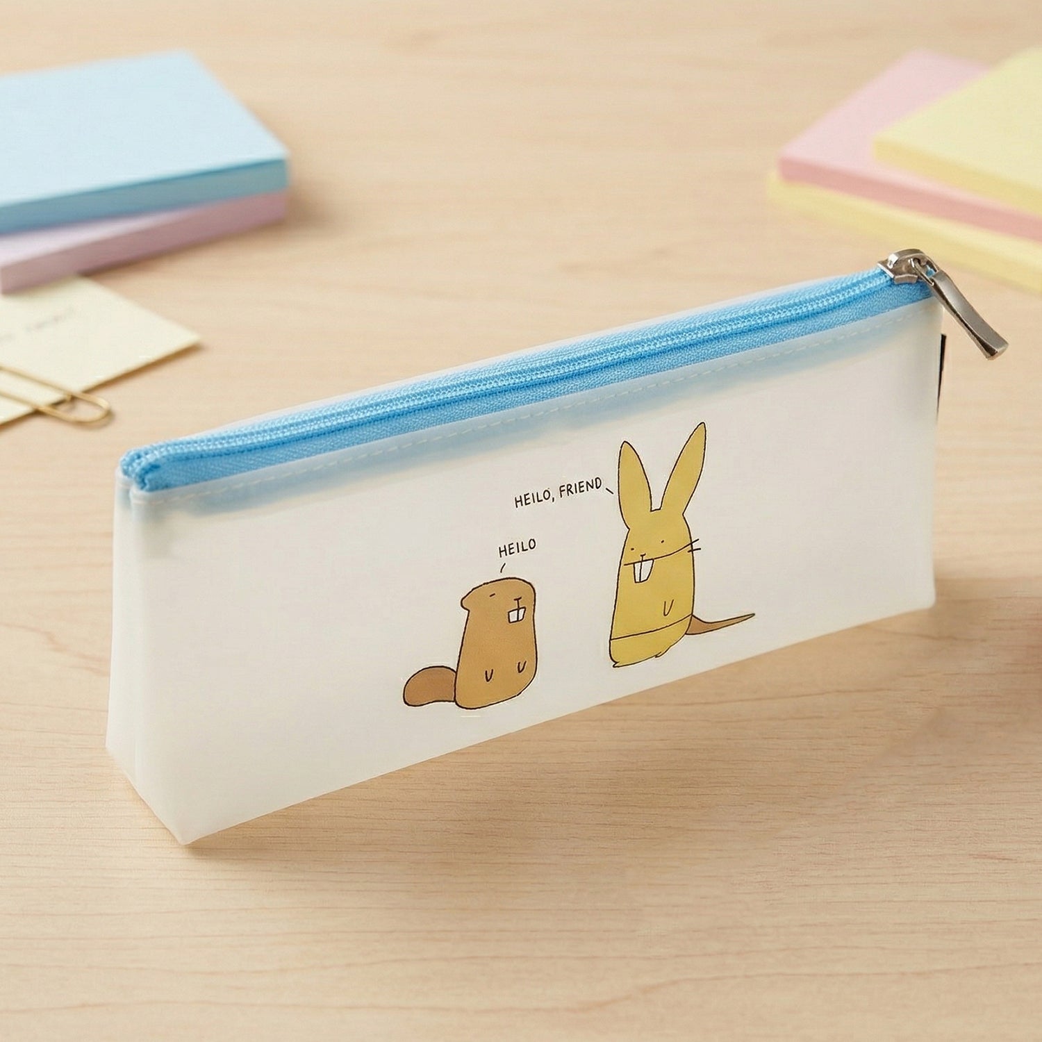 Wukusy cute cartoon transparent pencil pouch showing colorful interior and zip closure, ideal for school supplies.
